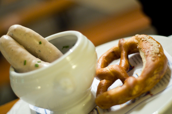 Boiled sausages and pretzel